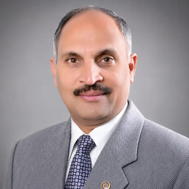 Dr J K Sharma